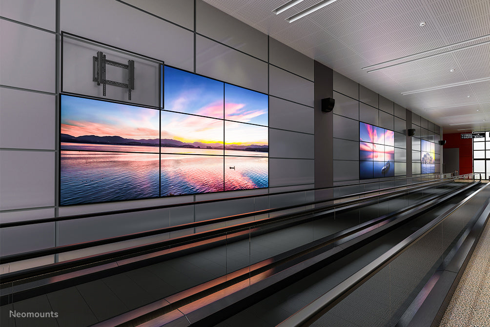 Neomounts LED-VW2500 zwart1 est un support mural plat pour mur vidéo pour écrans jusqu'à 75 pouces (191 cm), pour montage horizontal et vertical - Noir