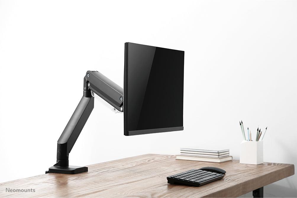 Neomounts NM-D775black est un support de bureau à vérin à gaz pour écrans plats jusqu'à 32 pouces (81 cm) - Noir