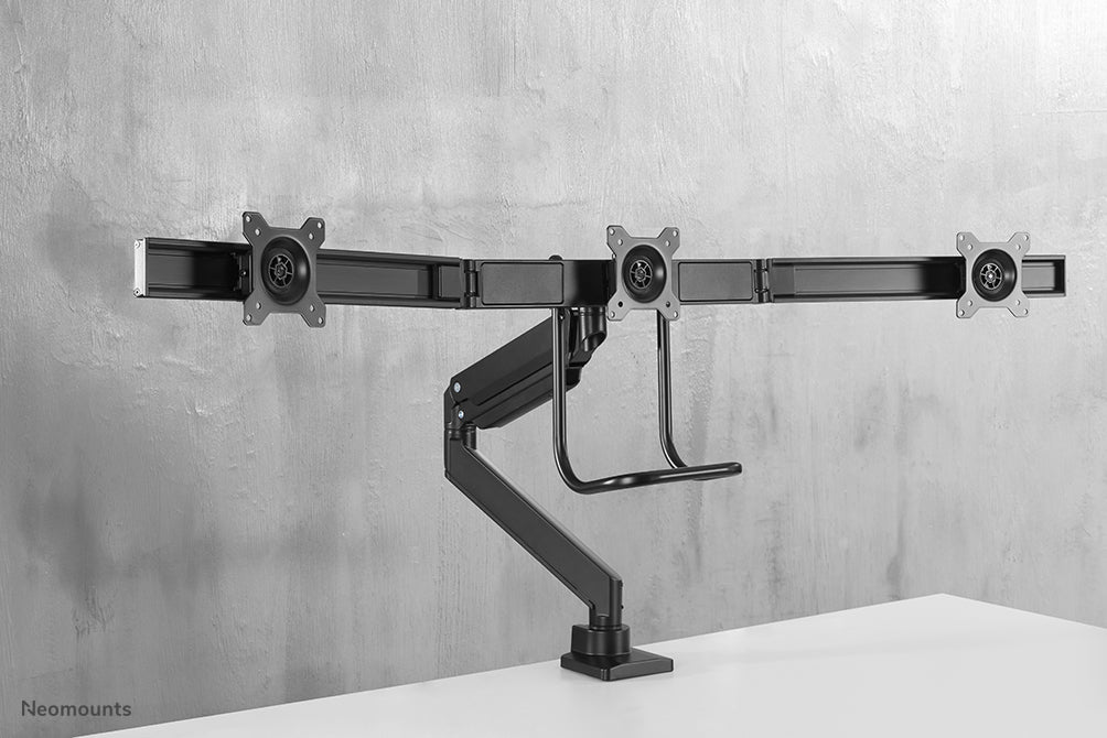 Neomounts NM-D775DX3 noir est un support de bureau à vérin à gaz avec barre transversale et levier pour écrans plats jusqu'à 27 pouces (68,6 cm).
