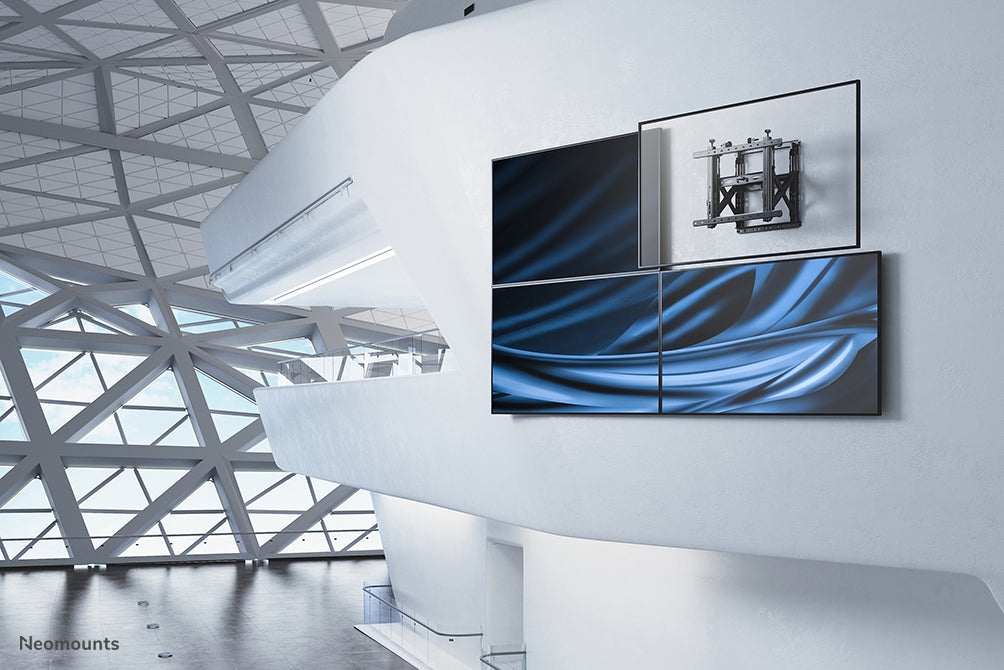 Neomounts WL95-900BL16 support de mur vidéo à pousser pour faire sortir pour écrans de 45-75 pouces - Noir